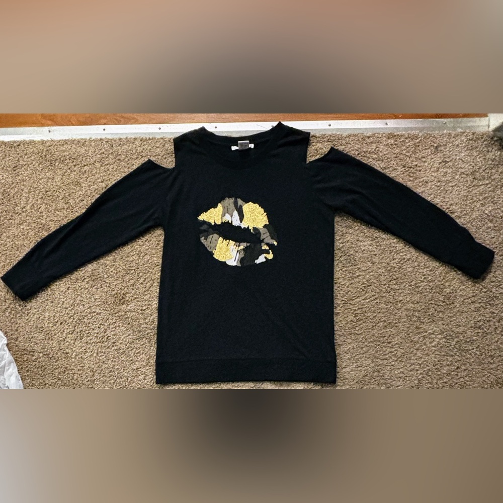 K. Jordan Woman Lg. Black Cutout shoulder Gold and silver kiss mark No callouts